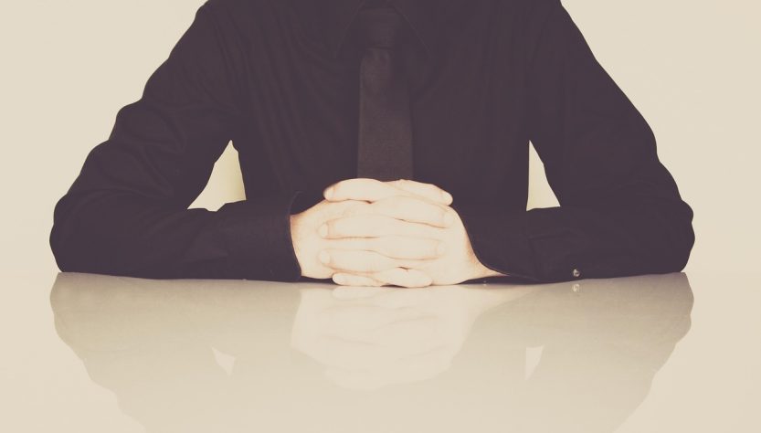 Businessman, office, necktie — Elevating Vein Care: Dr. Vidal Sheen's Holistic Approach Beyond Aesthetics