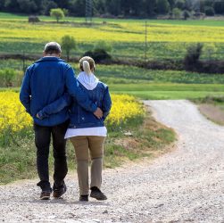 Walk, flower background, couple — New Beginnings: How New Jersey's Drug Rehab Facilities Are Making a Difference